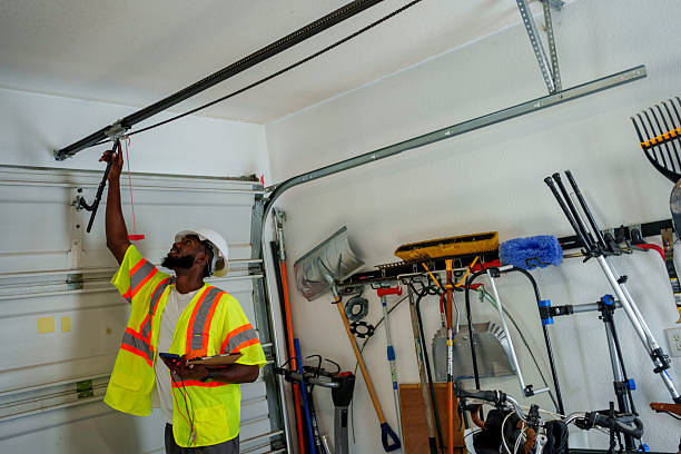 Professional Garage Door Panel Replacement technician working in Montpelier, IN